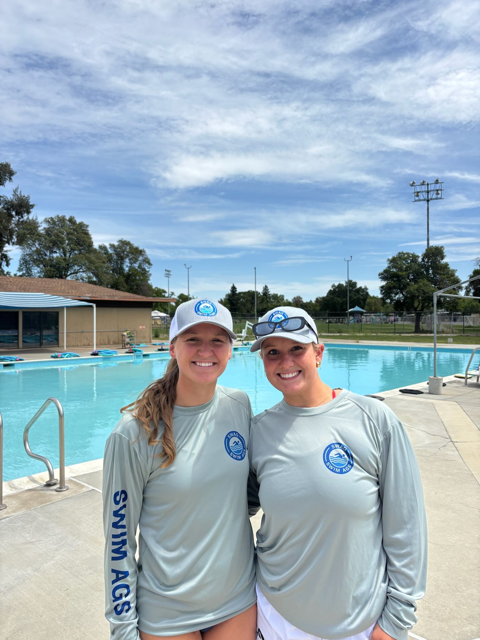Sadie and Lillie poolside at a SWAG clinic